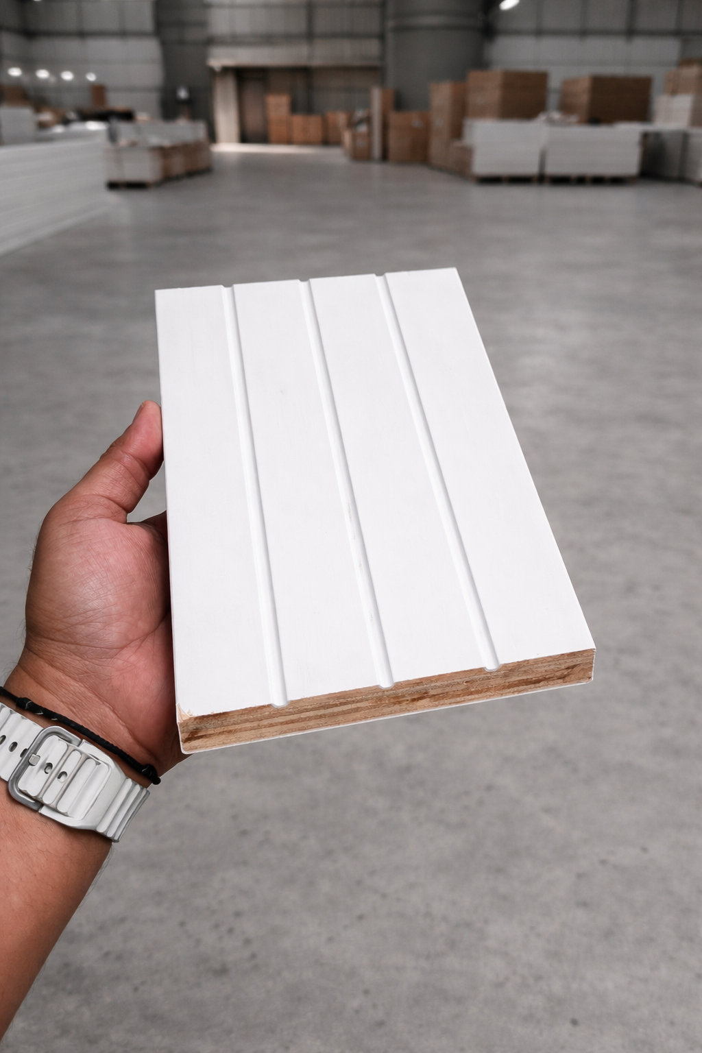 Primed LVL moulding sample held in hand
