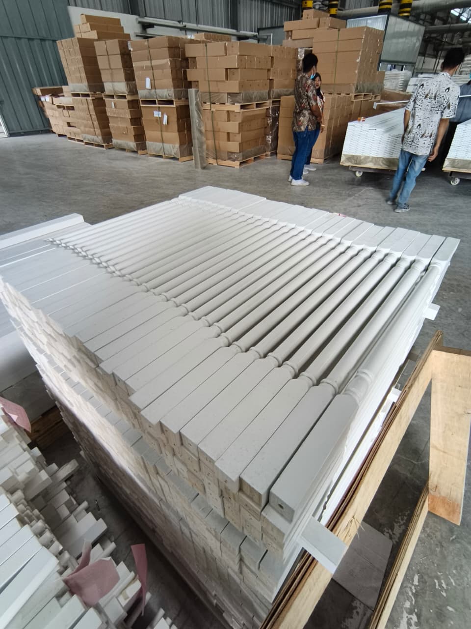 Primed balusters prepared for shipment and repeat production