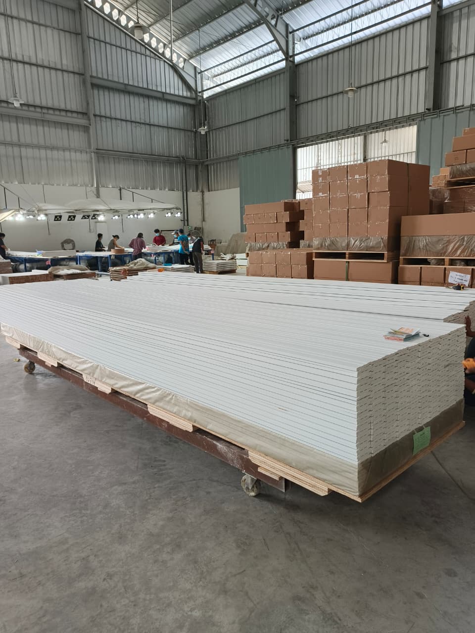 Large stack of LVL boards in factory