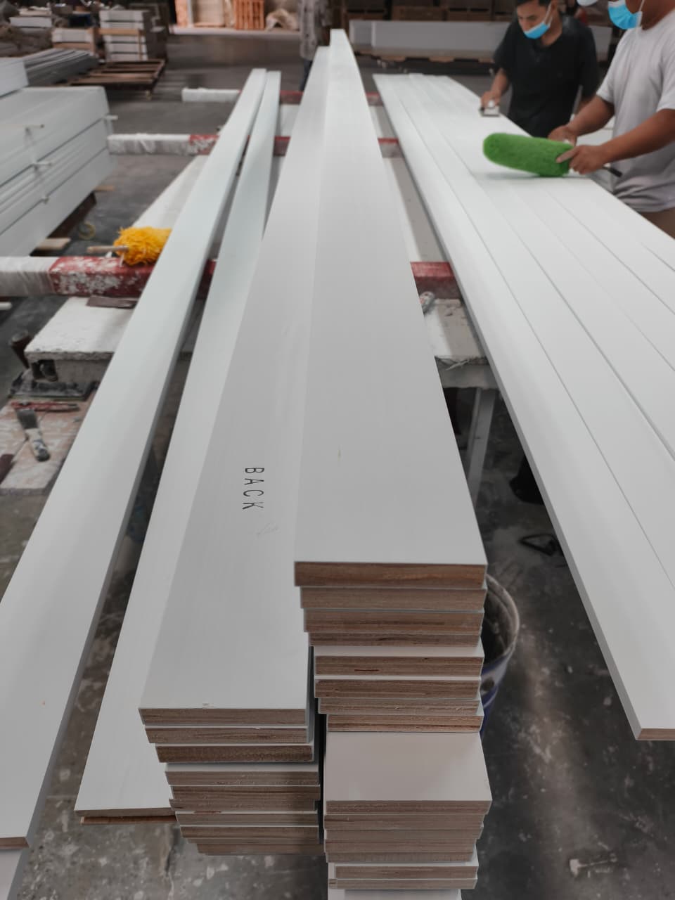 Primed LVL boards on production table